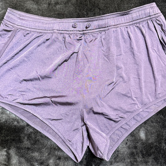 Men’s liquid shorts with thong liner.